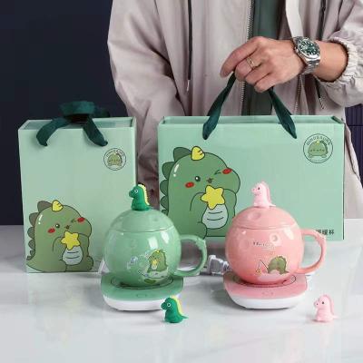 China 2022 Viable The Dinosaur's New Light Green Pink Planet Shape 55 Degree Ceramic Hot Mug Wholesale Gift Mug for sale