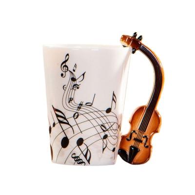 China Viable Wholesale Cheap Price 240ml Music Style Guitar Handle Creative Ceramic Mugs for sale