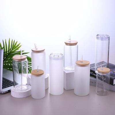 China Viable New Design 25oz Straw Sublimation Blank Beer Shaped Glass Bottle Soda Can Clear Tumbler With Bamboo Lid for sale