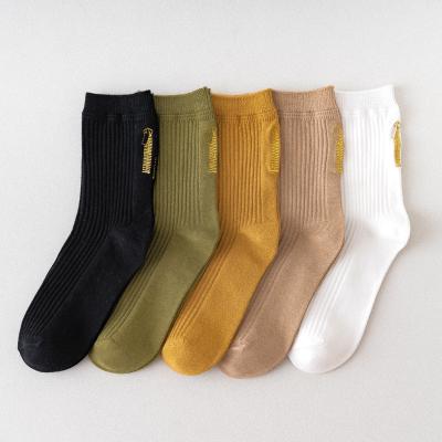 China OEM QUICK DRY Comlor Calcetines New Fashion School Socks Embroidered Zipper Cotton Socks Letter Crew Women Socks for sale