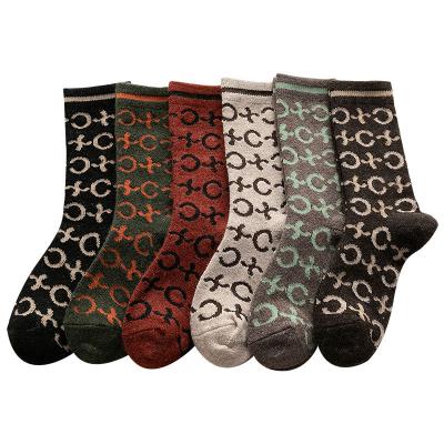 China 2021 Autumn New OEM Trend Creative Adult Tube Sock Fashion Leopard Print Wool Tube Women Breathable Luminous Silk Socks Long for sale