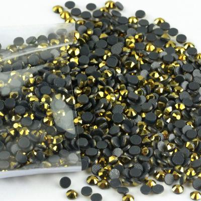 China Hot Dmc Gold Faux Stone Fix Back Flatback Flatback Ss10 Decorative Hematite Stone for sale