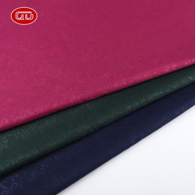 China Color fastness design new custom emboss toyobo 80% polyester 20% rayon garment men suit woven fabric for sale