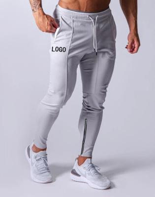 China Logo Cotton Jogger Men's Slim Fit Sweatpants Anti-Static Drawstring Jogger Zipper Sweatpants Men's Slim Fit Sweatpants Gym Sport Pants for sale