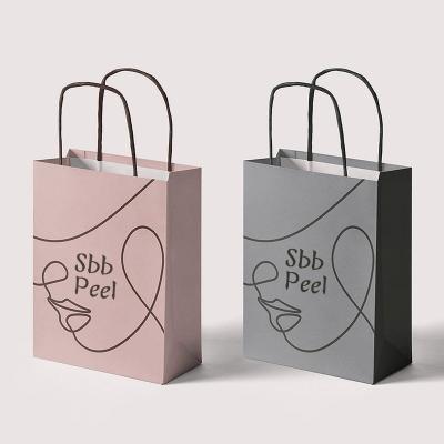 China Recycled Materials Good Price Of Large Gift Bags Wholesale Customized Paper Printing Gift Bags With Custom Logo for sale