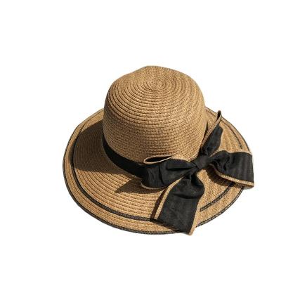 China Straw Hat Fashion Women Beach Sun Women Summer Beach Paper Sun Protection Bucket Foldable Straw Hat With Bow Ribbon for sale