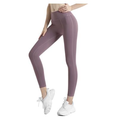 China Anti-Wrinkle Compression Gym Pants With Pocket Fitness Yoga Wear High Waist Stretch Fit Women Yoga Gaiters for sale