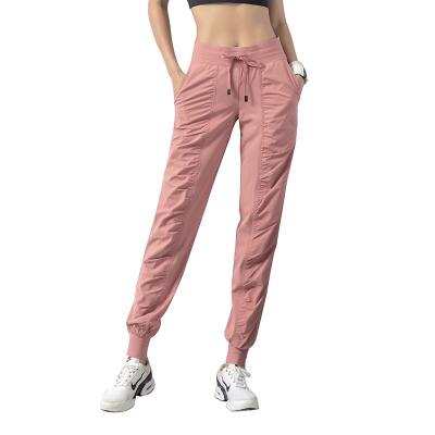 China 2021 QUICK DRY spring and autumn new high-waisted and loose purple sweatpants and casual pants women jogging pants for sale