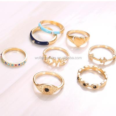 China Fashionable Gold Enamel Band Love Heart Minimalist Stacking Eye Ring Set for sale