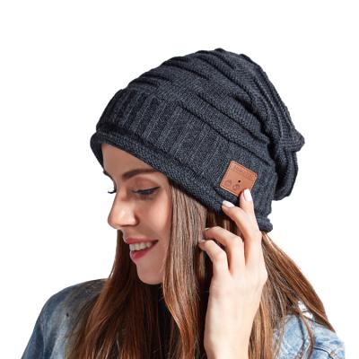 China In-ear Winter Outdoor Sport Knitted Hairball Beanie With Earphone Earphone Wireless Stereo Speaker MIC for sale