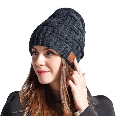 China In-ear Winter Outdoor Sport Knitted Hairball Beanie With Earphone Earphone Wireless Stereo Speaker MIC for sale