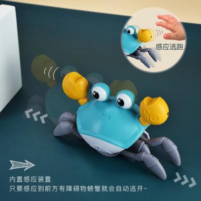 China Automatic Obstacle Avoidance Crab Race Ground Walking Induction Toys Plastic Crab Toy With Light And Music Automatic Obstacle Avoidance for sale