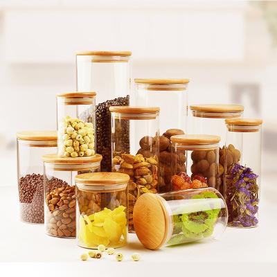 China Viable Kitchen Glass Canisters Clear Glass Food Storage Jar With Airtight Bamboo Lids for sale