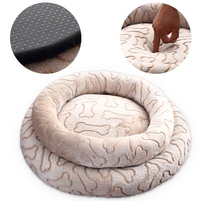 China Comfortable Stocked Pet Donut Nest Self-heating Cat Cushion Dog Velvet Round Bed for sale