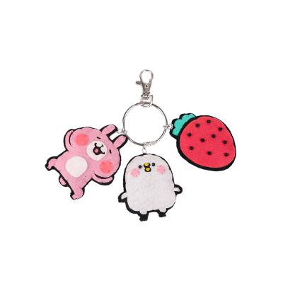 China Diy Toy Pink Keychain Designers Strawberry Rabbit Penguin Eco-friendly Material Nonwoven Pendant for sale