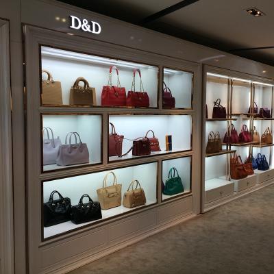 China Bags shop custom contemporary display handbag store decoration bag store shelves luxury store display for sale