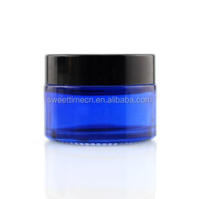 China Personal Care 1.5 Oz Blue Cosmetic Paint Jar With Black Cap for sale