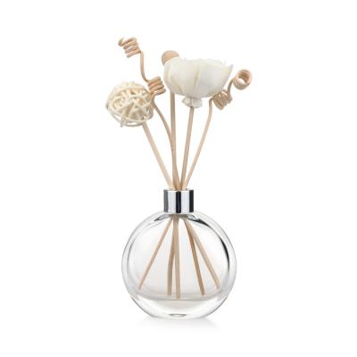 China Personal Care Flat Round Empty Glass Air Freshener Aroma Reed Diffuser Bottle With Rattan Sticks for sale