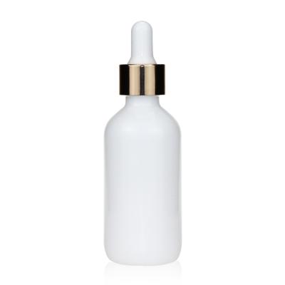 China Personal Care 2oz 60ml Opal White Porcelain Boston Round Glass Dropper Bottle for sale