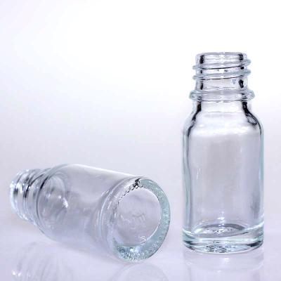 China Personal care 10ml clear vial glass box essential oil dropper bottle with cosmetic containers and gold pump packaging for sale