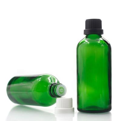 China Hot sale essential oil 100ml yb green glass bottle for body care oils for sale