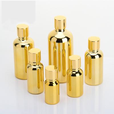 China Personal Care 5ml 10ml 15ml 20ml 30ml 50ml 100ml Gold Plating Glass Empty Perfume Bottles for sale