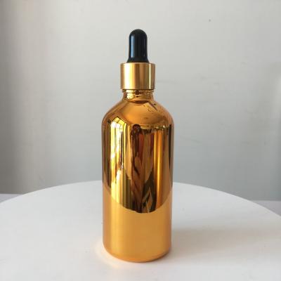 China Empty Personal Care 5ml-100ml Gold Glass Essential Oil Dropper Bottle for sale