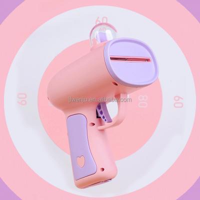 China Toy Gun Pink Plastic Gun Toy Paper Gun Pink Heart Spray Gun Toy for sale