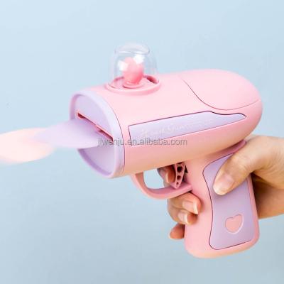 China Toy Gun Pink Plastic Automatic Toy Gun Pink Heart Paper Spray Gun Toy Gun for sale