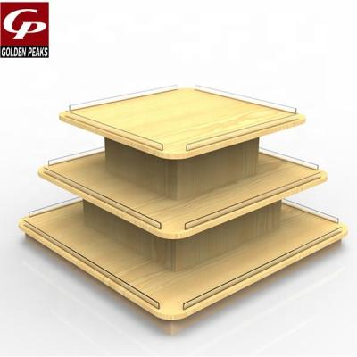 China Double Sided Supermarket Shop Store Pedestal Rack 3 Tier Selling Wooden Display Table for sale