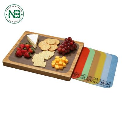 China Sustainable Easy-to-Clean Bamboo Cutting Board and 7 Flexible Color-Coded Cutting Mats with Food Icon Set for sale