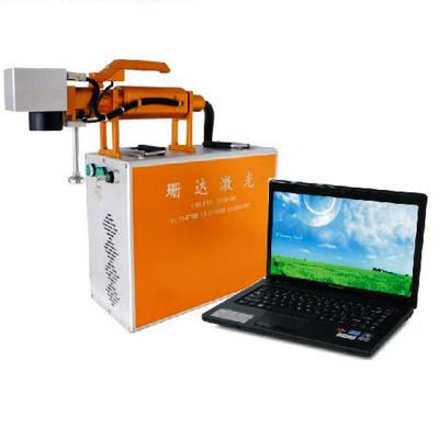 China Low Price 20W Portable Fiber Laser Marking Machine For Metal And Plastic for sale