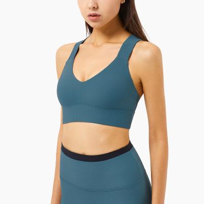 China Beautiful Back Breathable Fashion Friendly Sexy Cross Ribbed High V Neck Yoga Underwear Women Fitness Women Yoga Wear for sale