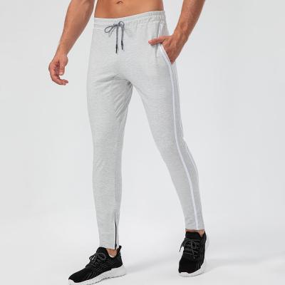 China Dropshipping Viable Wholesale Men's Casual Joggers Pants Slim Fit Sweatpants For Sporty Gym Workout With Zipper Ankle Cuffs for sale