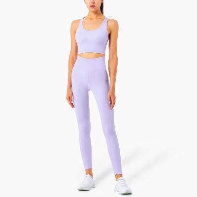 China Breathable Custom Logo Elastic Waist High Top Pants And Active Bra Wear Workout Gym Fitness Sets Women Yoga Trial Suit Seamless Set for sale