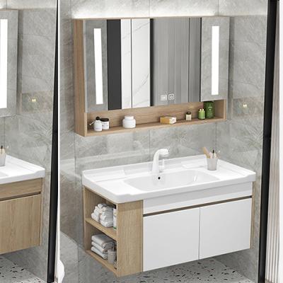 China Modern European Style Solid Wood Bathroom Cabinet With Basin Makeup Vanity One Piece Bathroom Cabinet With Smart Mirror for sale