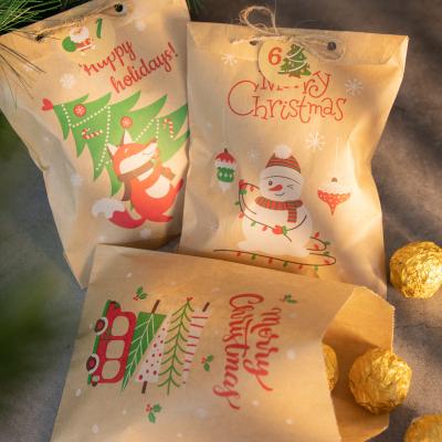 China 2022 Recycled Materials Christmas Kraft Paper Bags Santa Claus Snowman Christmas Bag Candy Cookie Gift Bag Pouch for sale