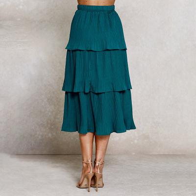 China Anti-Static Factory Promoted Stock Wholesale Women Elastic Waistband Tired Pleated A Line Flare Midi Skirt for sale