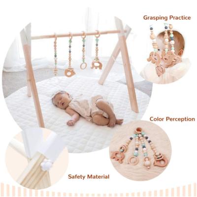 China XIHA Eco-Friendly Foldable Baby Play Gym Frame Activity Gym with 3 Wooden Baby Teether Toys Montessori Baby Activity Gym for sale