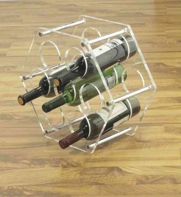 China Custom Acrylic Bottle Display Size Red Wine Wine Rack Display For Retail Stores for sale