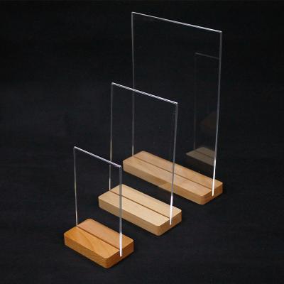 China Advertising clear acrylic sign holder with wooden base insert card menu acrylic wood holder for sale