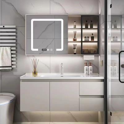 China Modern Smart bathroom cabinet ceramic integrated basin made of simple solid wood, mirror cabinet combination with light strip for sale