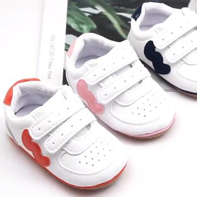 China 0-1 Years Old Newborn Baby Shoes PU Leather TPR Casual Comfortable Sole Shoes White Toddler Breathable Baby Shoes for sale