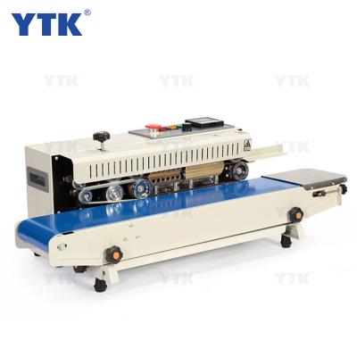 China FR900 Automatic Continuous Food Film Sealing Machine Coffee Bag Strip Sealer for sale