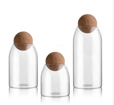 China Homemade Custom Glass Jars Wholesale Glass Jar With Wooden Lid Cork Ball Storage Tank for sale