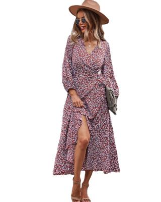 China Anti-wrinkle 2021 autumn and winter floral casual dress with chest wrapped strap and large swing skirt for sale