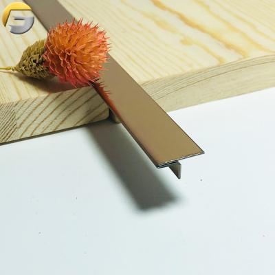 China Free Sample V0304 Modern Classic Titanium Color Mirror Gold Cavity T-shape Stainless Steel Profiles Ceramic Tile Trim for sale