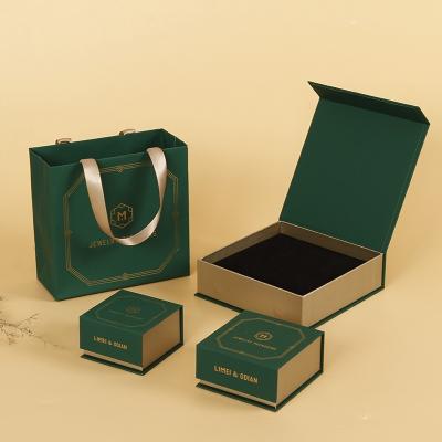 China Recyclable Luxury Elegant Cute Logo Packaging Shopping Paper Gift Jewelry Bag With Tag for sale