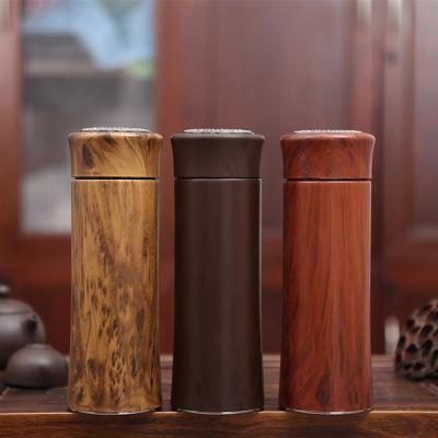 China Business Traditional Wood Grain Sand Liner Stainless Steel Thermos Vacuum Flask Purple Water Cup Bottle for sale