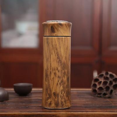 China Business Traditional Wood Grain Sand Liner Purple Stainless Steel Bottle , Tea Drinking Bottle for sale